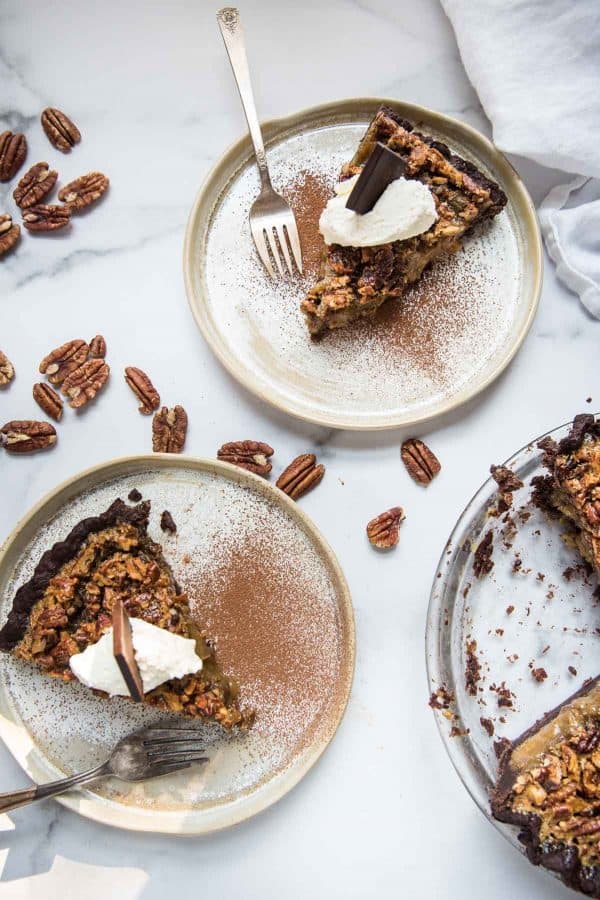 sliced of pecan pie on plates