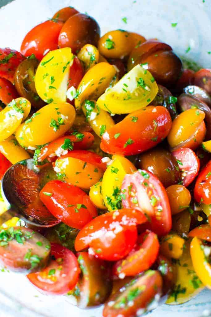 heirloom cherry tomatoes sliced in half, soaked in white wine and garlic