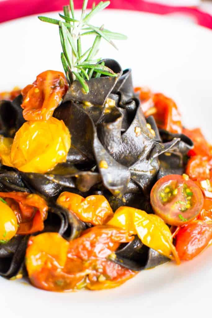 Fresh, handmade squid ink pasta with heirloom tomato sauce