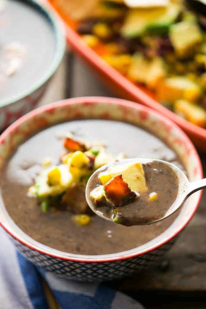Bacon-Avocado Corn Salsa adds the perfect crunch to smooth and smoky black bean soup.
