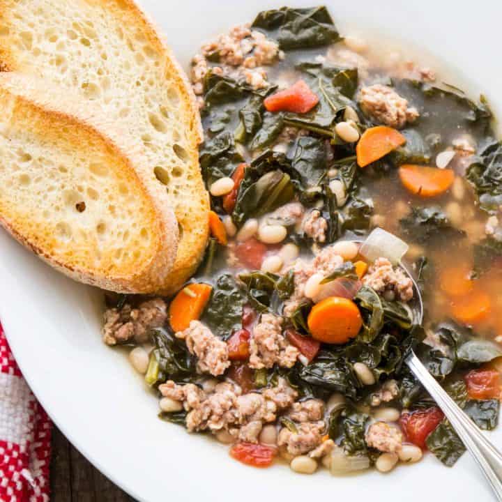 Sweet Italian Sausage, tender White Beans, and rustic Tuscan Kale are the stars in this hearty Italian soup!