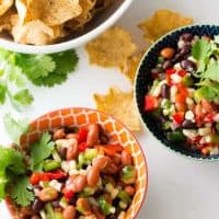 black bean salsa in small bowls with tortilla chips