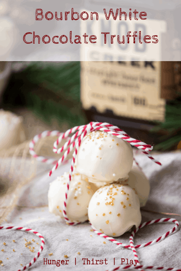 Creamy white chocolate center with warming bourbon flavors and a crunchy chocolate shell. These holiday candies are perfect for gift giving, as stocking stuffers, or to bring to your next holiday party. #holidaycandy #christmasdesserts #bourbonandchocolate