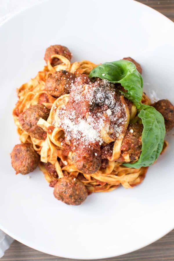 overhead angle of pasta with meatballs and cheese