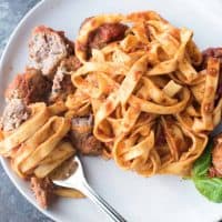 Fork tender meatballs loaded with parmesan and fresh shredded mozzarella for ultimate cheesy goodness.