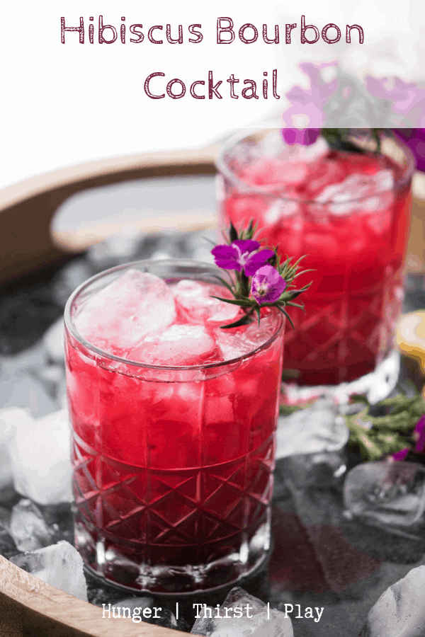 Hibiscus Bourbon Cocktails are good all year round but especially in the end stretch of winter when you're ready for warmer weather. Sweet floral notes, warming bourbon and natural vanilla make for the perfect party cocktail. #bourbon #hibiscus