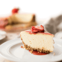 This New York Style Cheesecake is creamy, dense, and just the right amount of sweet with a gluten free and nut free crispy crust!