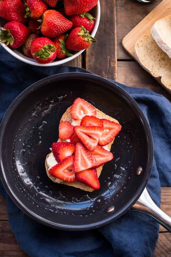 Melty, creamy brie cheese, sweet ripe summer strawberries, and a hint of fresh thyme sandwiched between crisp, buttery country white bread for the ultimate summer grilled cheese.