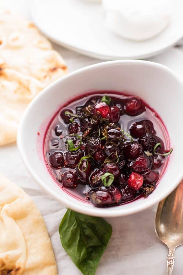 A year round snack that comes together in a pinch! Cranberry Basil Flatbreads are full of fresh, sweet and savory flavors with gooey burrata - perfectly snackable!