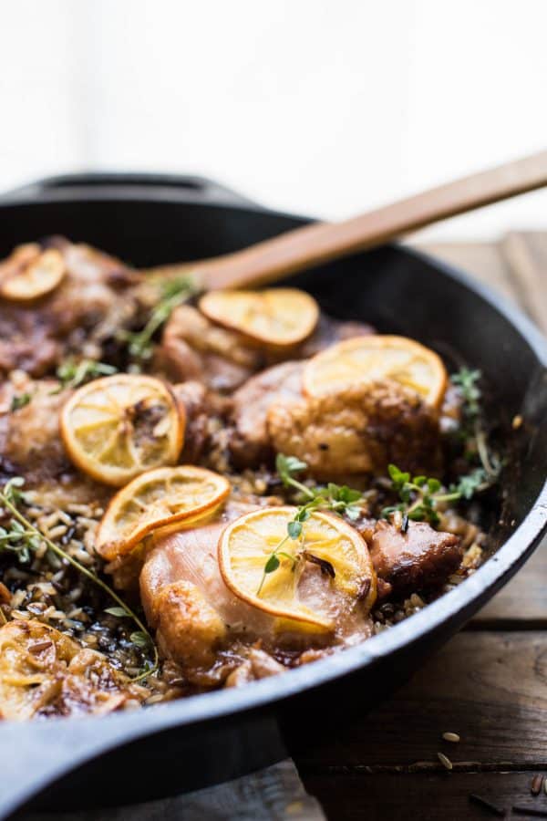 One Pan Lemon Chicken Thighs over Wild Rice in Cast Iron Pan