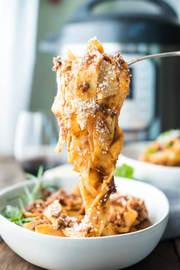 Forkful of pappardelle pasta with instant pot lamb ragu