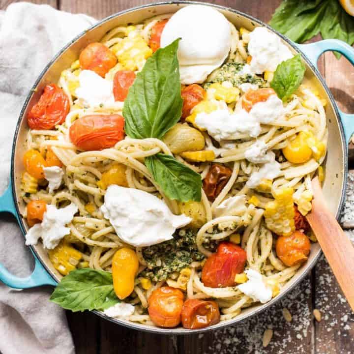 Veggie Pesto Pasta with tomatoes, corn, and burrata