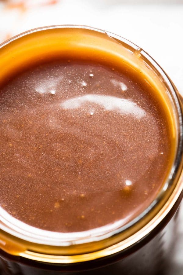 Close up of salted caramel sauce in mason jar