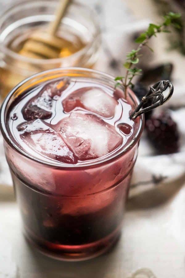 close up of blackberry honey cocktail