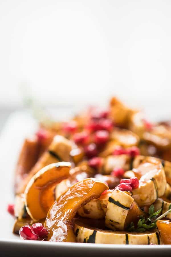 roasted side squash with maple, soy, and pomegranate seeds