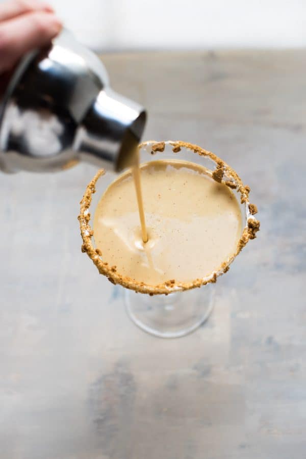 gingerbread eggnog pouring into a glass