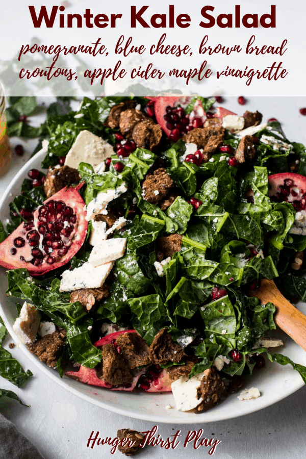 bowl of winter salad with kale and pomegranate