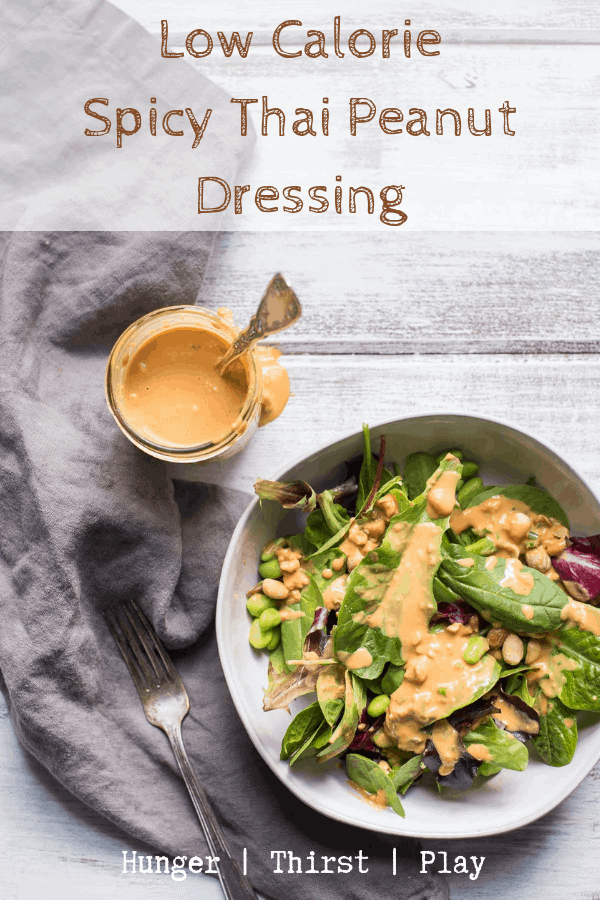Everything there is to love about thai peanut sauce but with a low-calorie option! Low-Calorie Thai Peanut Dressing uses powdered peanut butter to bring creamy peanut butter taste with 85% less calories. Perfect for salads, on top of Thai dishes or as a veggie dip. An easy way to lighten up peanut butter! #powderedpeanutbutter #thaipeanutsauce