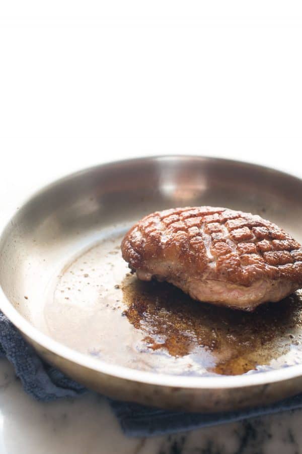 pan-seared duck breast in a skillet