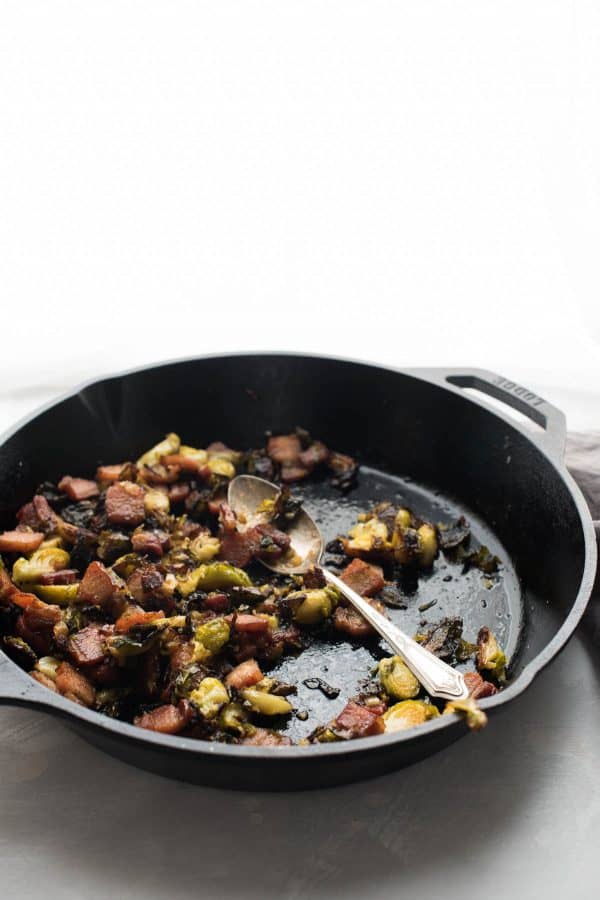 cast iron roasted brussels sprouts with crispy pork belly and honey garlic sauce