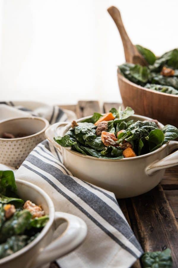 individual portions of warm spinach salad