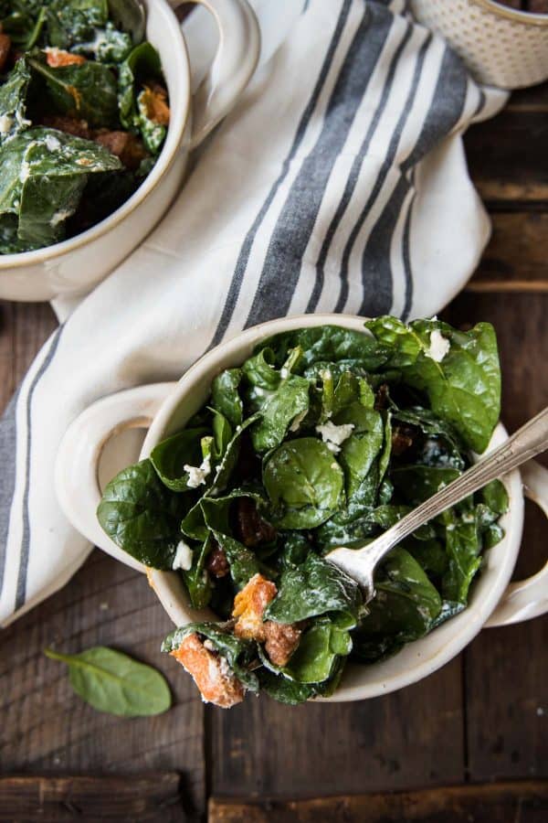 individual portions of warm spinach salad