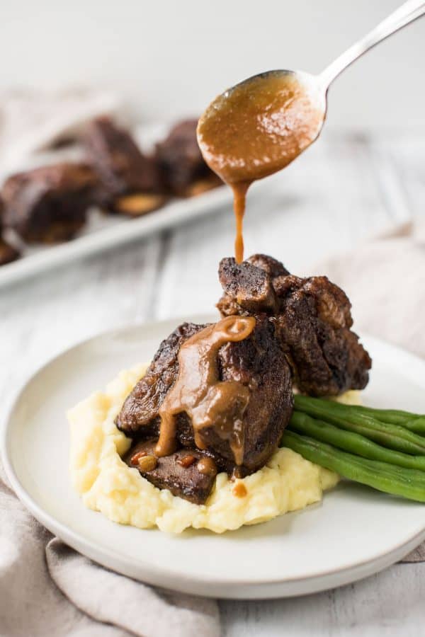 Rich, slow simmered stout beer sauce over tender short ribs