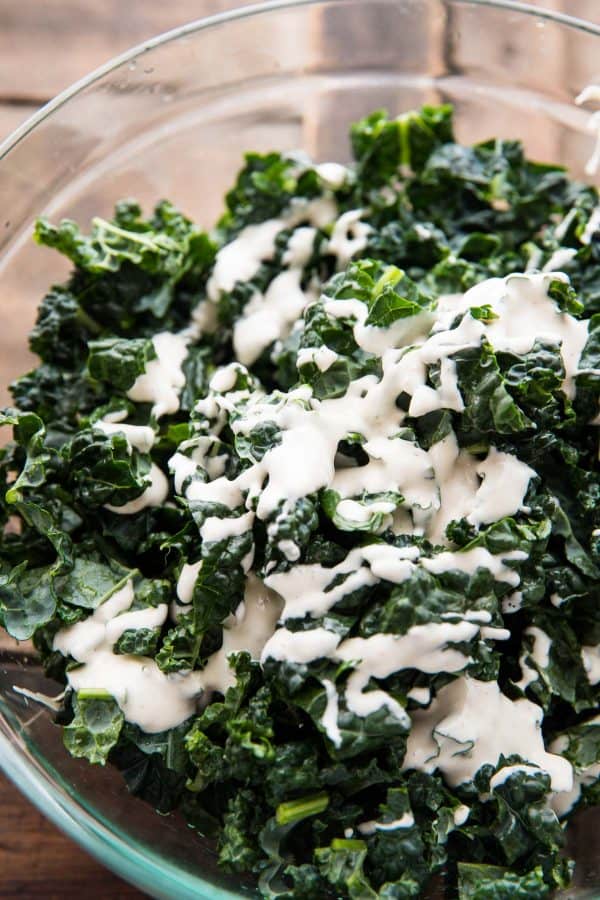 tuscan kale drizzled with caesar dressing