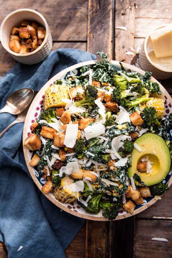 Bowl of roasted broccoli and kale caesar salad