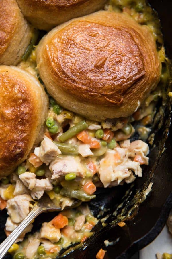 close up of chicken pot pie filling in a cast iron pan