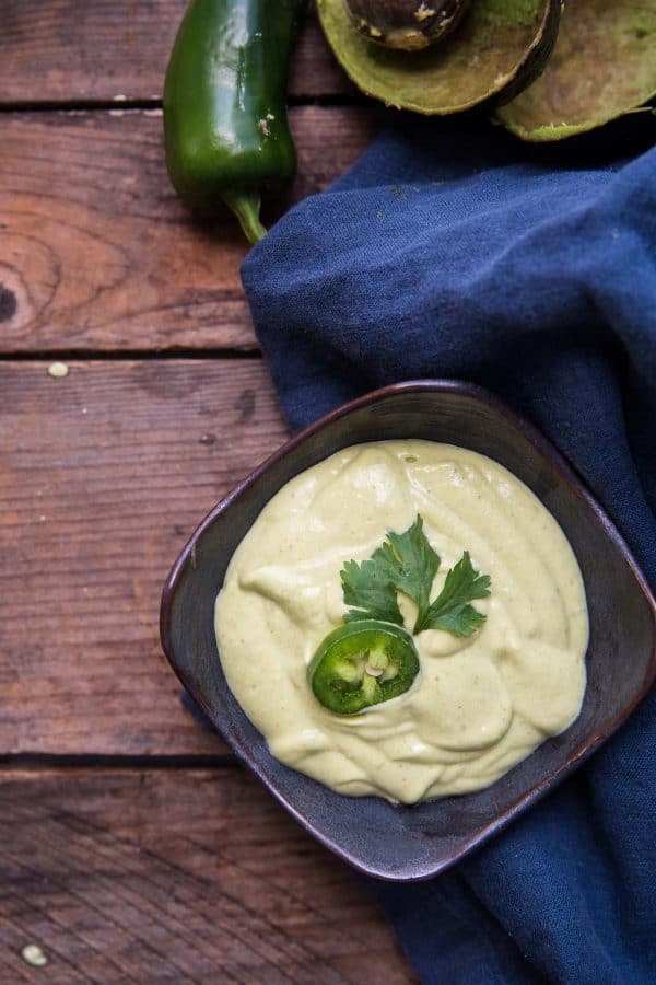 overhead of creamy jalapeno avocado crema