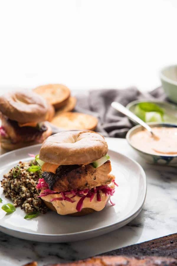 Stacked cedar plank salmon on mini bagels