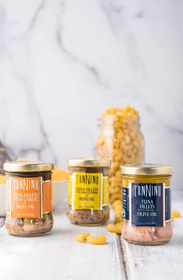 jars of tonnina tuna on display with macaroni