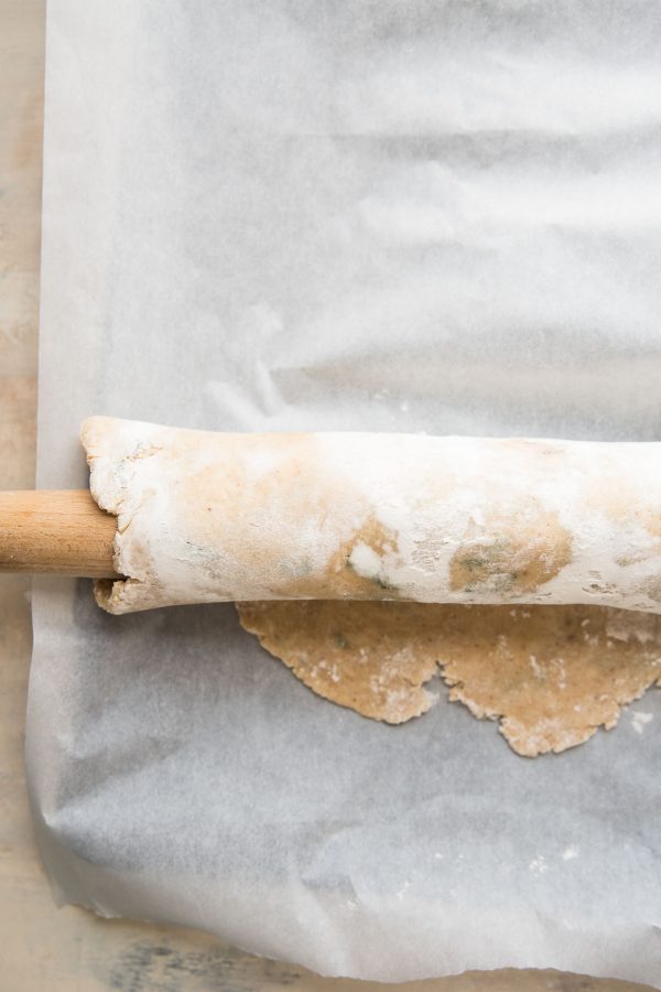 pie dough rolled over a rolling pin
