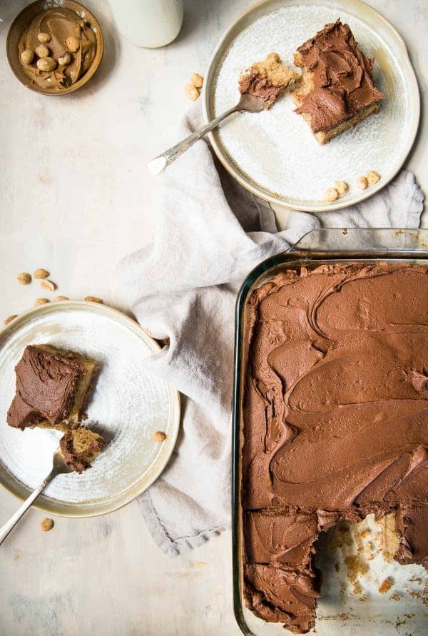 overhead of peanut butter sheet cake in the pan with slice cut out