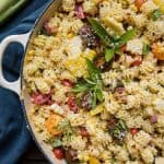 close up of summer pasta salad with an ear of corn