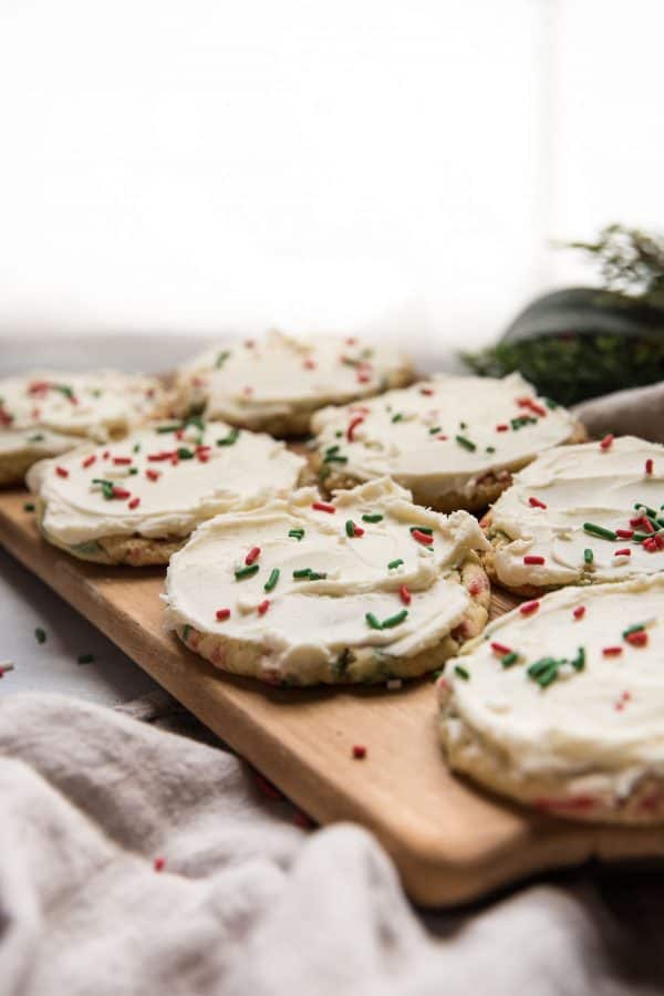 frosted cookies for santa on a wooden platter