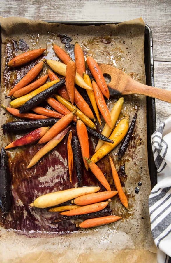 roasted rainbow carrots on a sheet tray