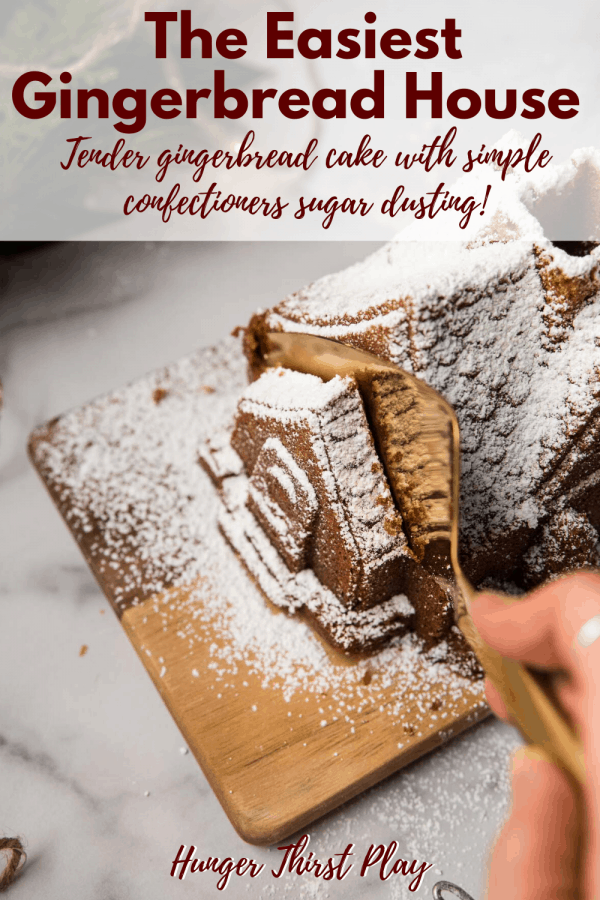 slicing gingerbread house cake