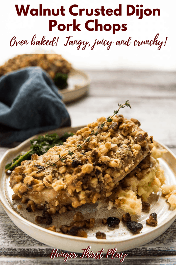 walnut crusted pork chop staked on mashed potatoes