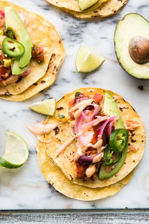 overhead of fish tacos on a corn tortilla