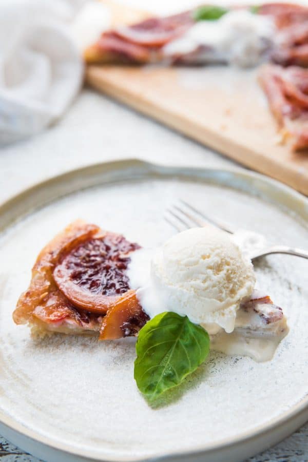 close up of ice cream on blood orange mascarpone tart