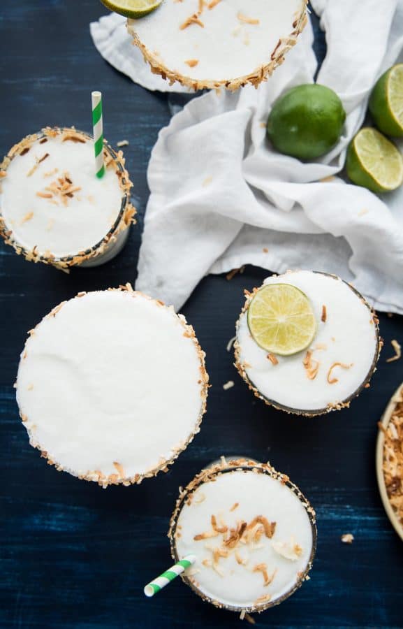 overhead angle of different glassware with coconut margaritas