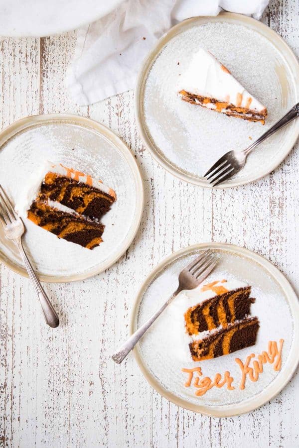 slices of tiger cake on plates with forks