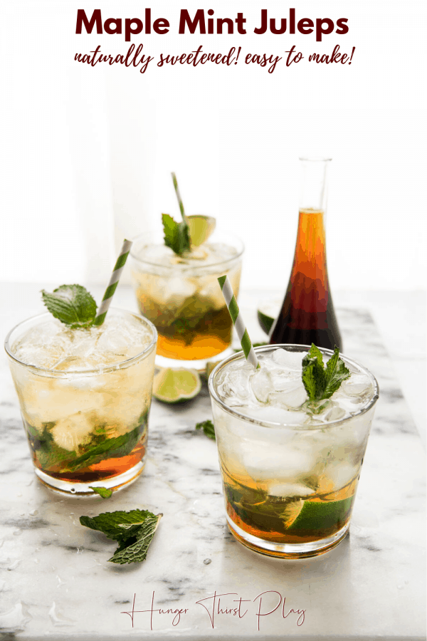 ice and mint filled cocktail glasses on marble