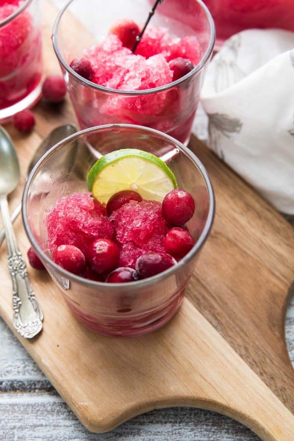 close up of frozen cranberry vodka slushie in a glass