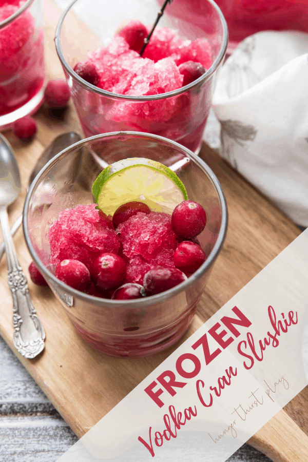 pitcher filled with frozen cranberry vodka slushies