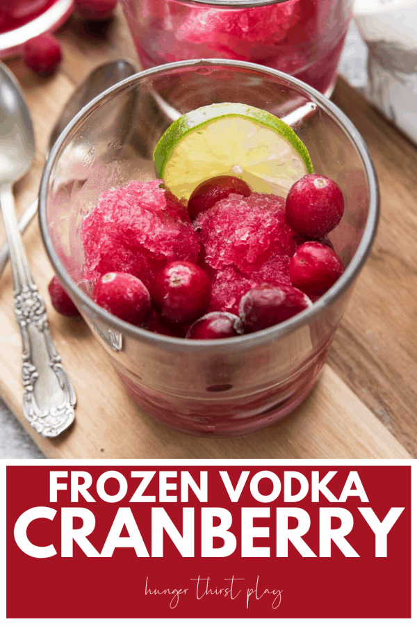close up of frozen cranberry vodka slushie in a glass