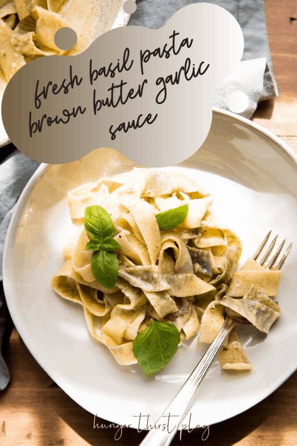 overhead close up of basil pappardelle wrapped around a fork