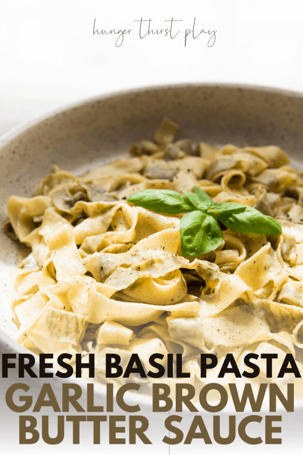 close up of fresh basil pasta in a serving bowl